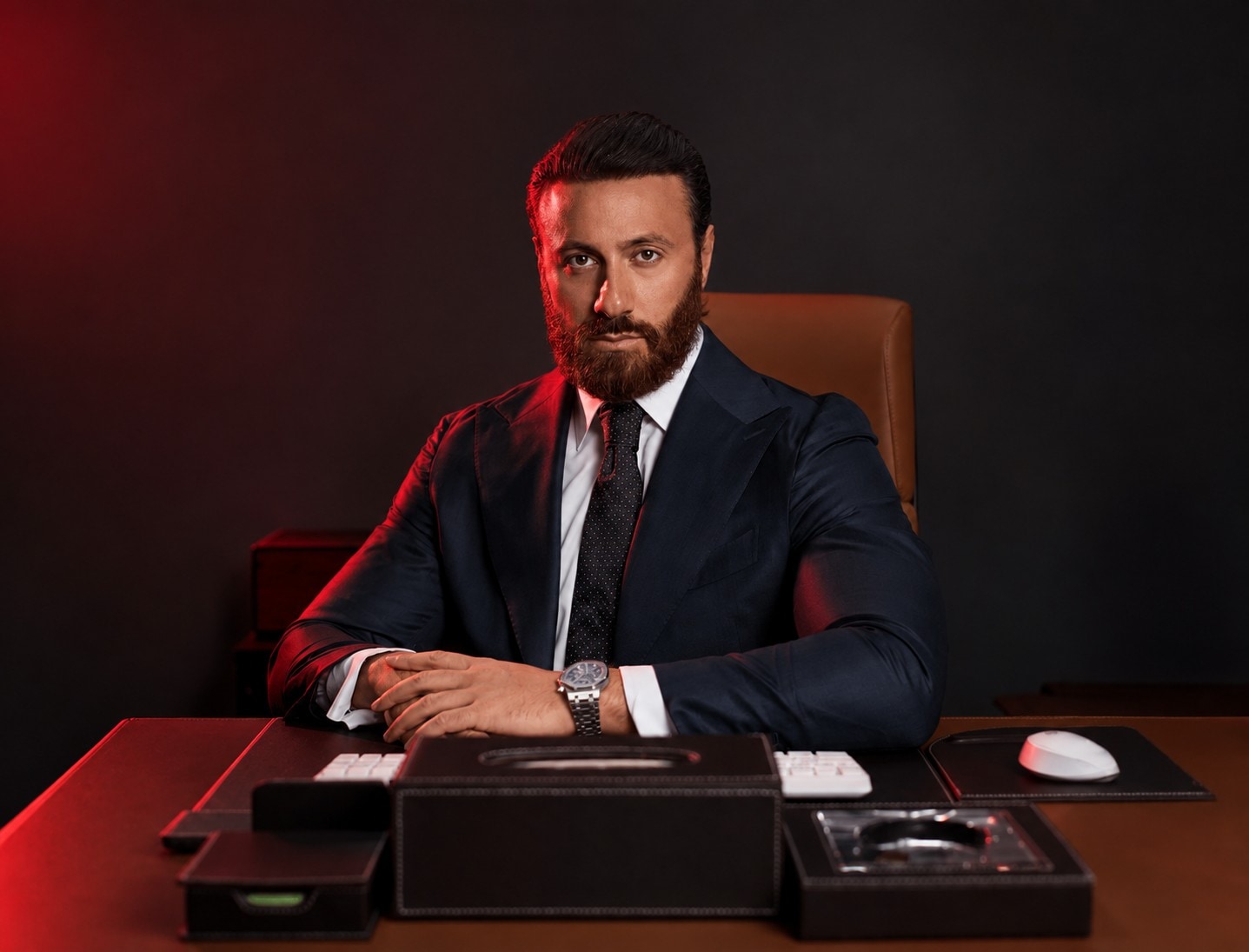 Samir Jezzini seated at his desk